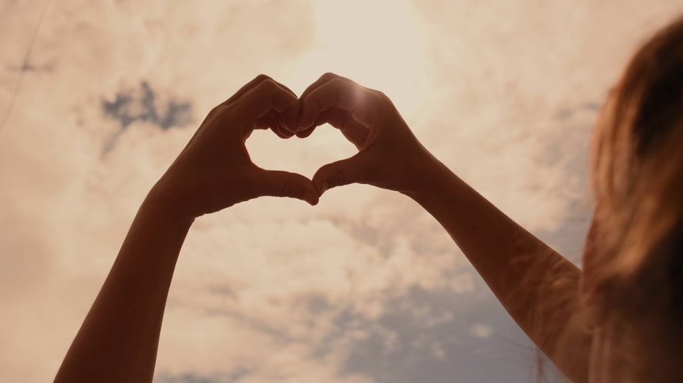 Why it’s Great to Practice Yoga in the Summer 5 Two hands forming a heart shape