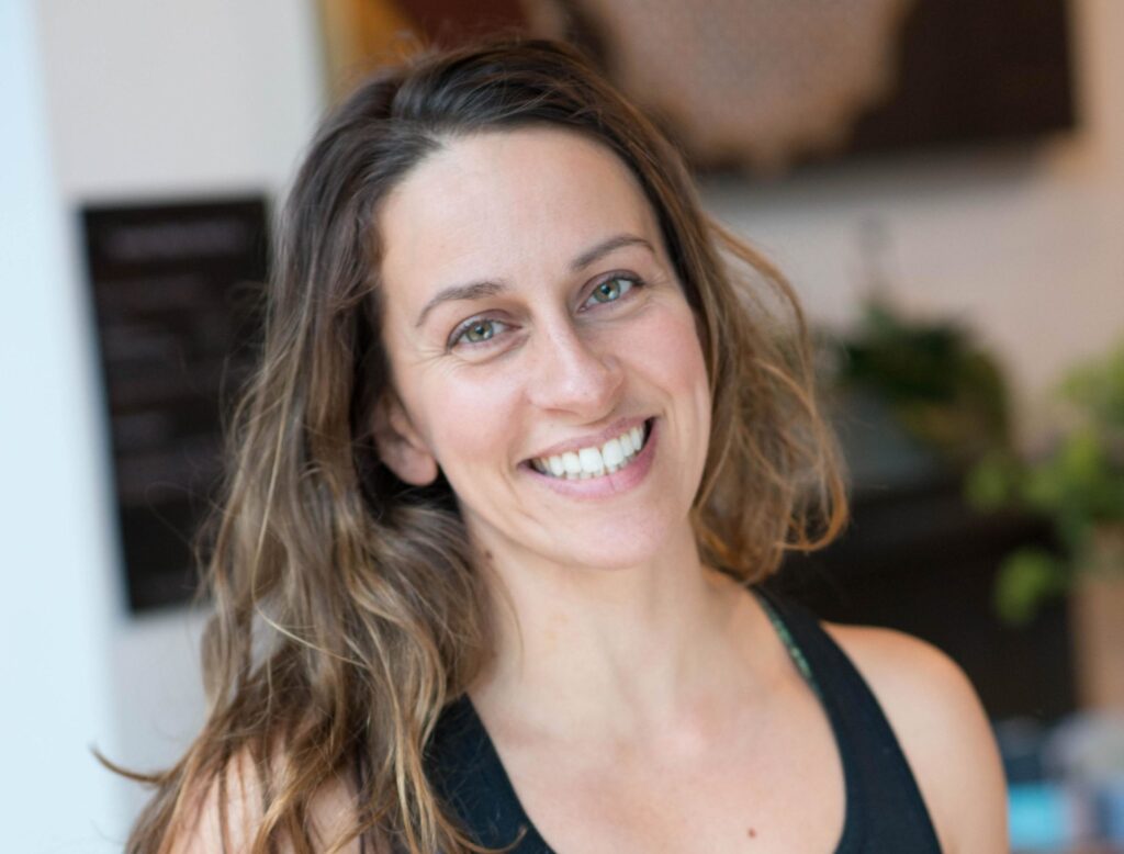 Portrait of a smiling yoga teacher