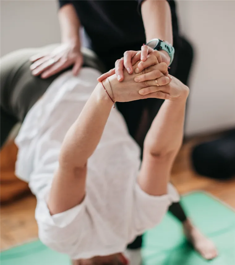 A hands-on adjustment during training
